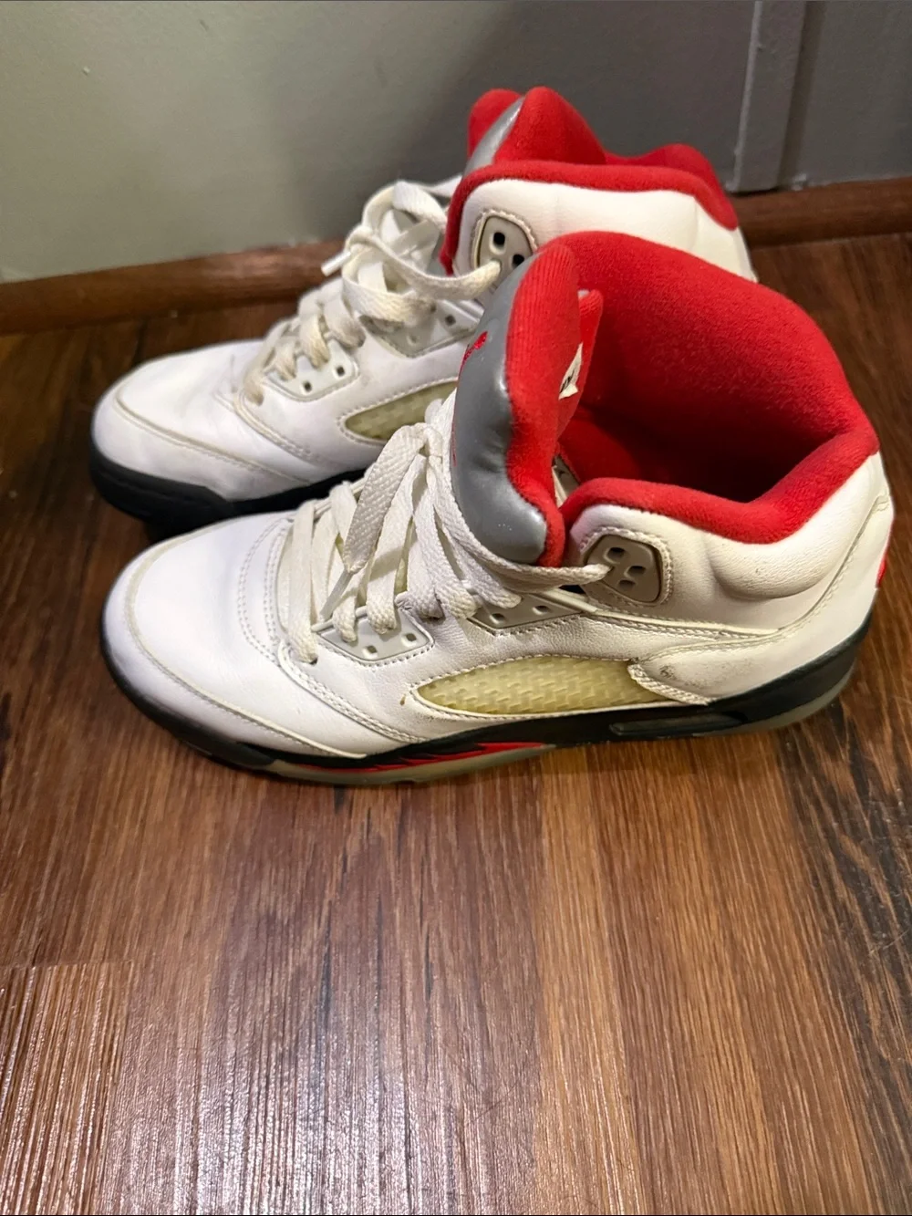 Nike Kids' White and Red Basketball Sneakers with Metallic Silver Tongue